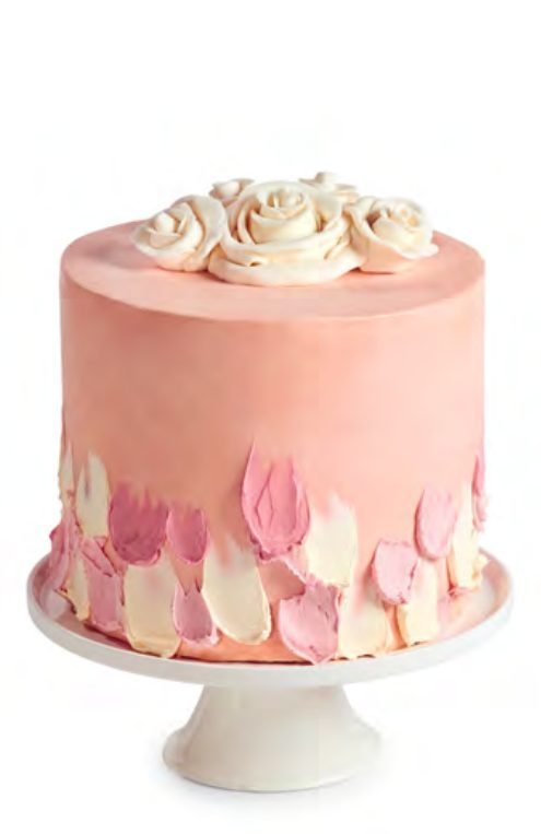 Love Is in the Air blush pink cake with petal detailing